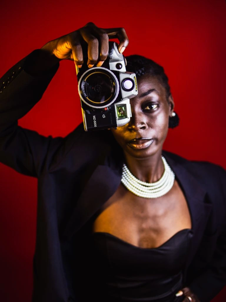 Photograph of Reviews Editor Maren Okafor at her workstation