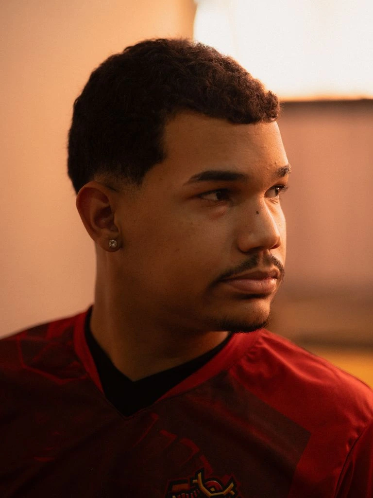 Photograph of Esports Lead Theo Iwasaki in the press box